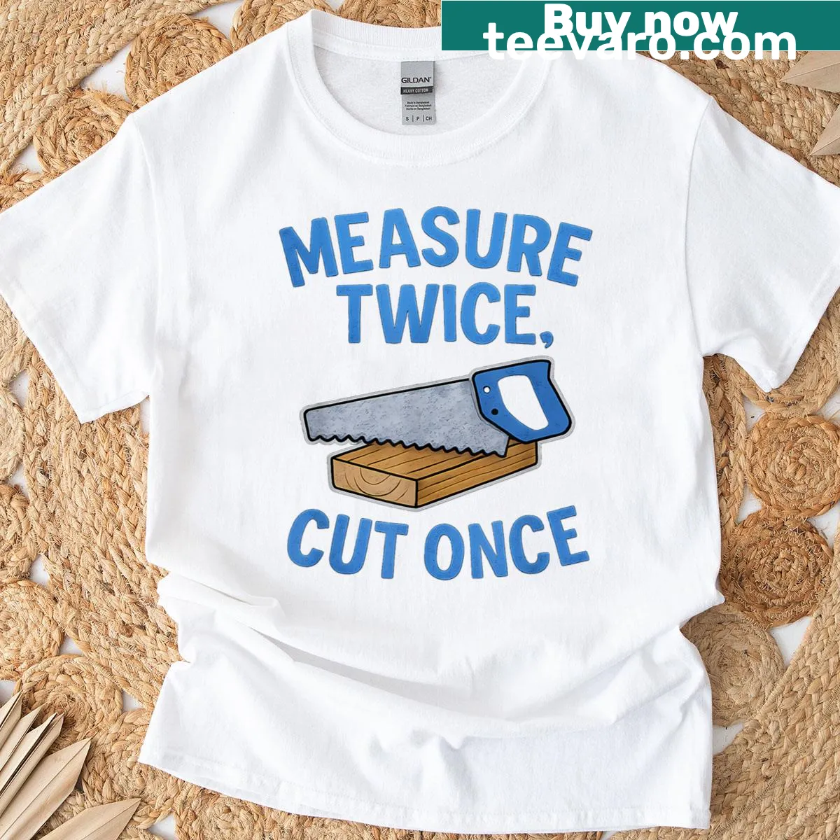 T-shirt with 'Measure Twice Cut Once' carpenter pun and graphic design. — on a men's t-shirt