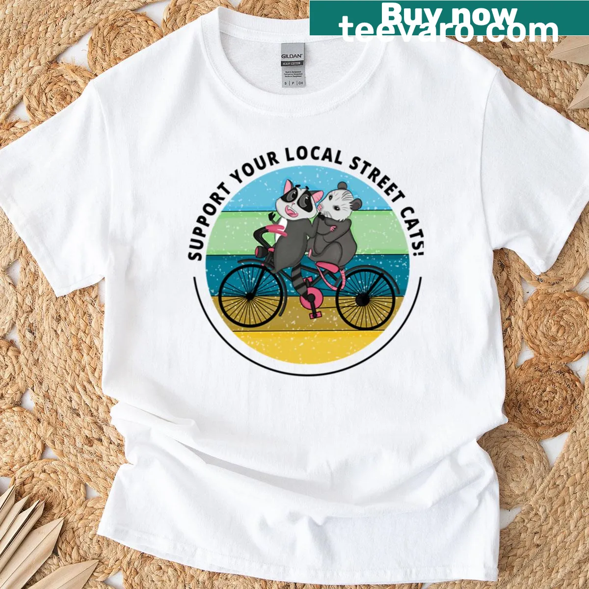 Playful graphic tee supporting local cats and raccoons. — on a men's t-shirt