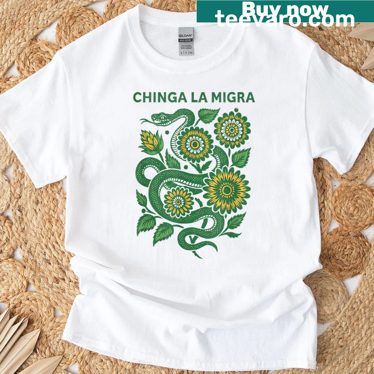 T-shirt featuring the phrase 'Chinga La Migra' in bold typography — on a men's t-shirt