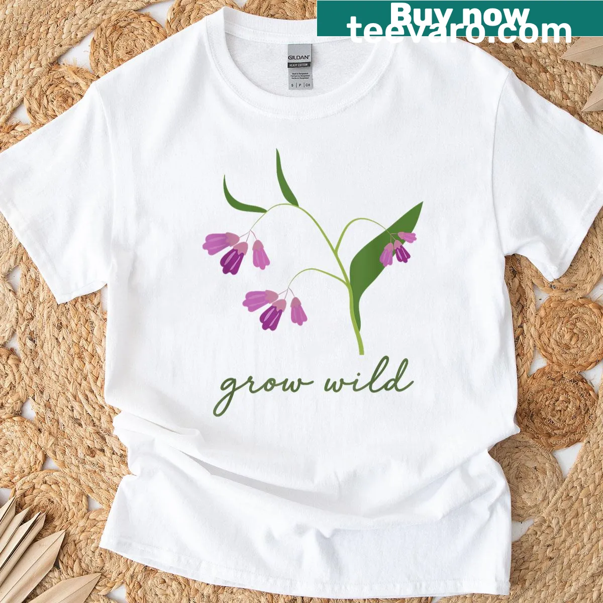 Graphic of comfrey leaves with text 'Grow Wild' — on a men's t-shirt