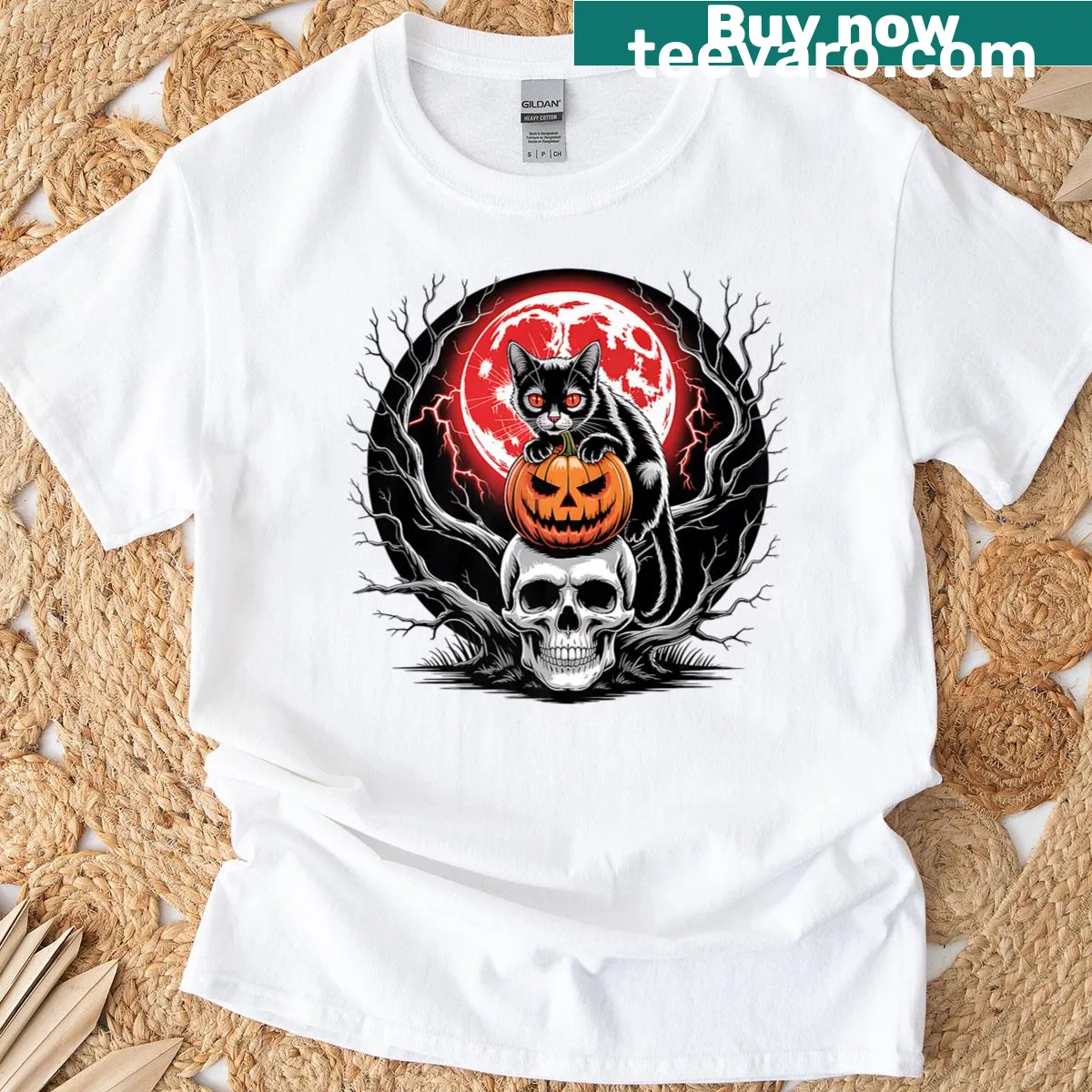 Halloween T-shirt featuring a black cat, pumpkin, and skull graphics. — on a men's t-shirt