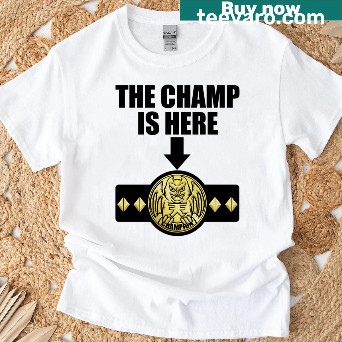 Typography graphic declaring 'The Champ Is Here' on T-shirt — on a men's t-shirt