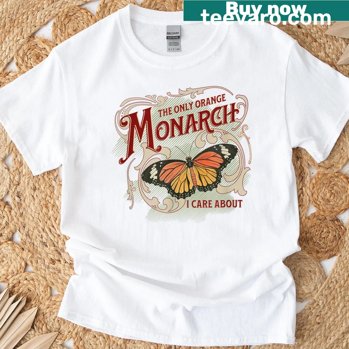 Retro T-shirt featuring an illustration of an orange monarch butterfly — on a men's t-shirt