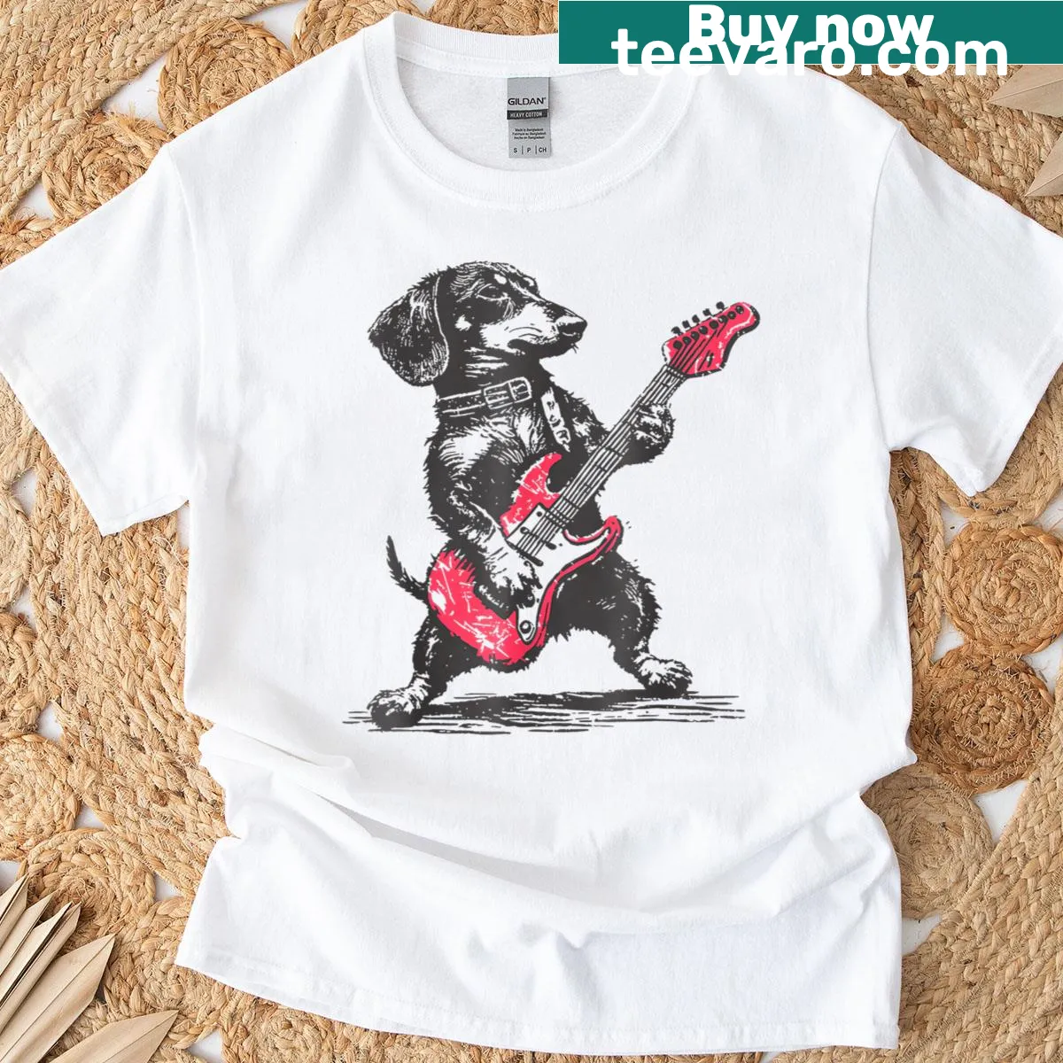 Vintage dachshund playing guitar rock and roll graphic t-shirt. — on a men's t-shirt