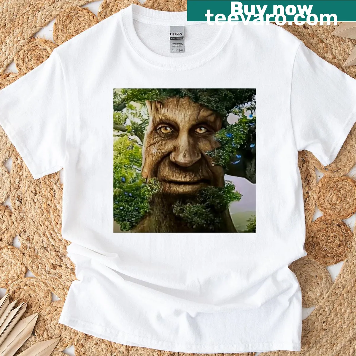 Illustrated t-shirt featuring a wise, mystical tree design — on a men's t-shirt