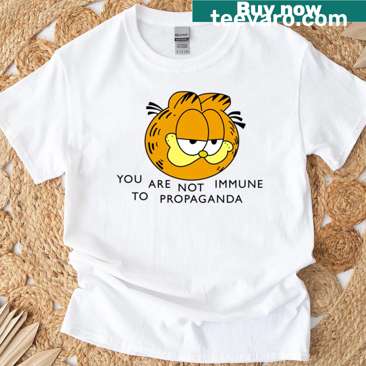 Typographic T-shirt with the phrase You Are Not Immune To Propaganda — on a men's t-shirt
