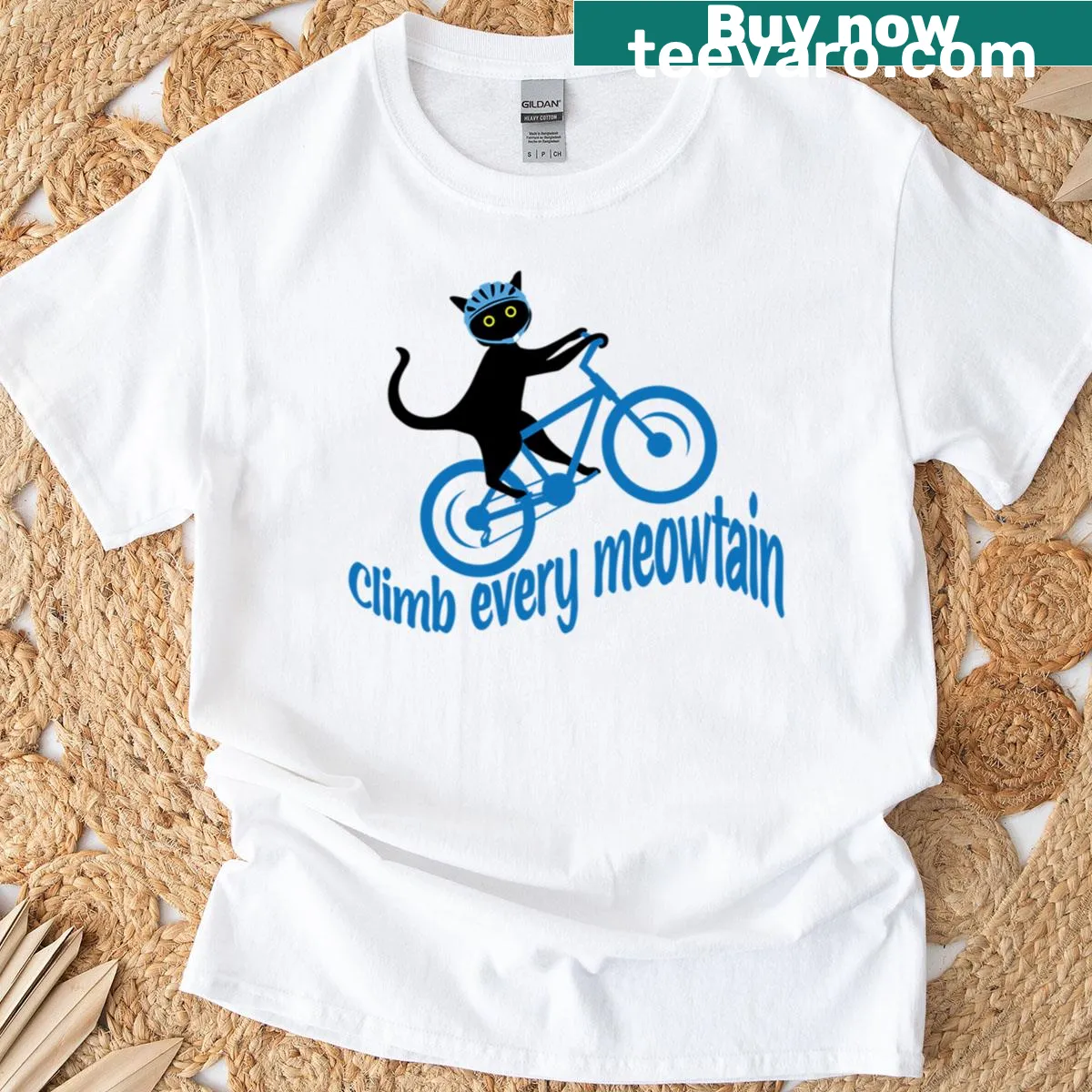 Illustrated cat riding a bicycle in a whimsical design — on a men's t-shirt