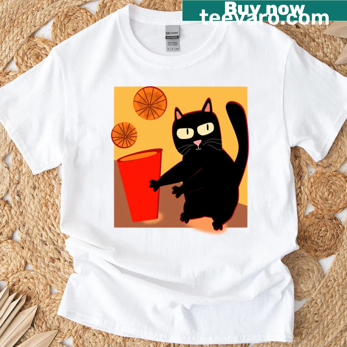 T-shirt featuring a black cat drinking orange juice — on a men's t-shirt