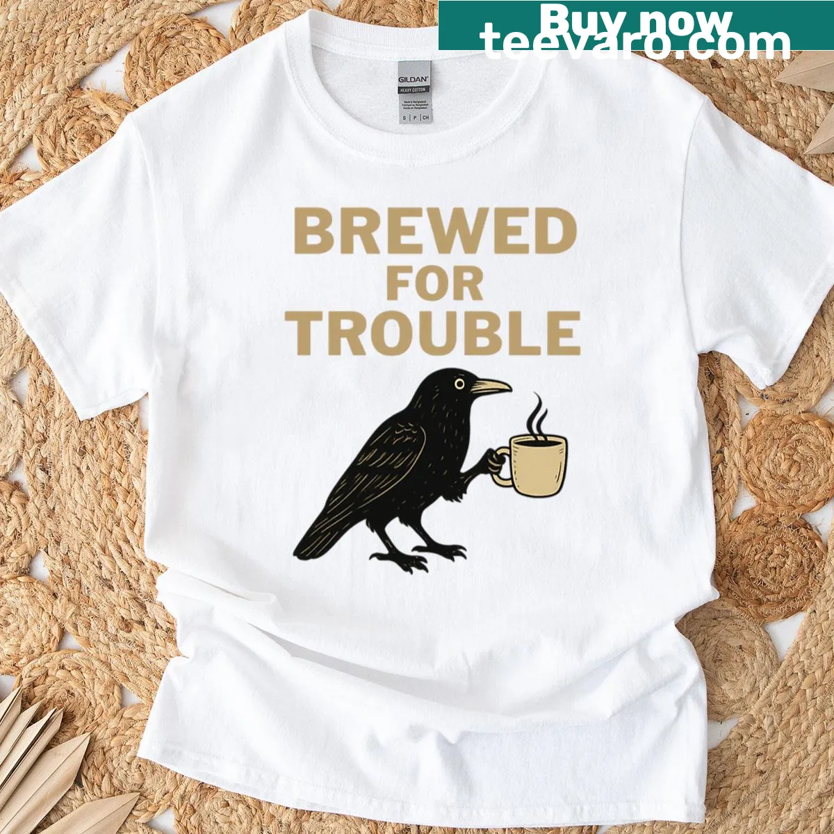 Vintage crow coffee t-shirt with humorous 'Brewed For Trouble' text — on a men's t-shirt