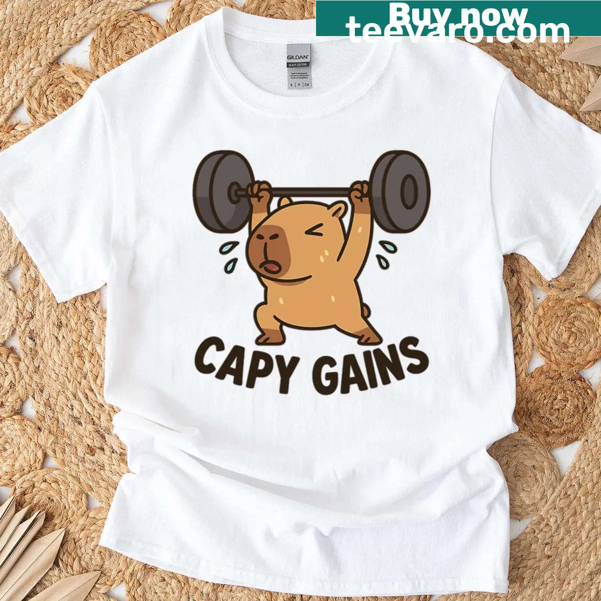 Oversized t-shirt featuring a strong capybara in workout design — on a men's t-shirt