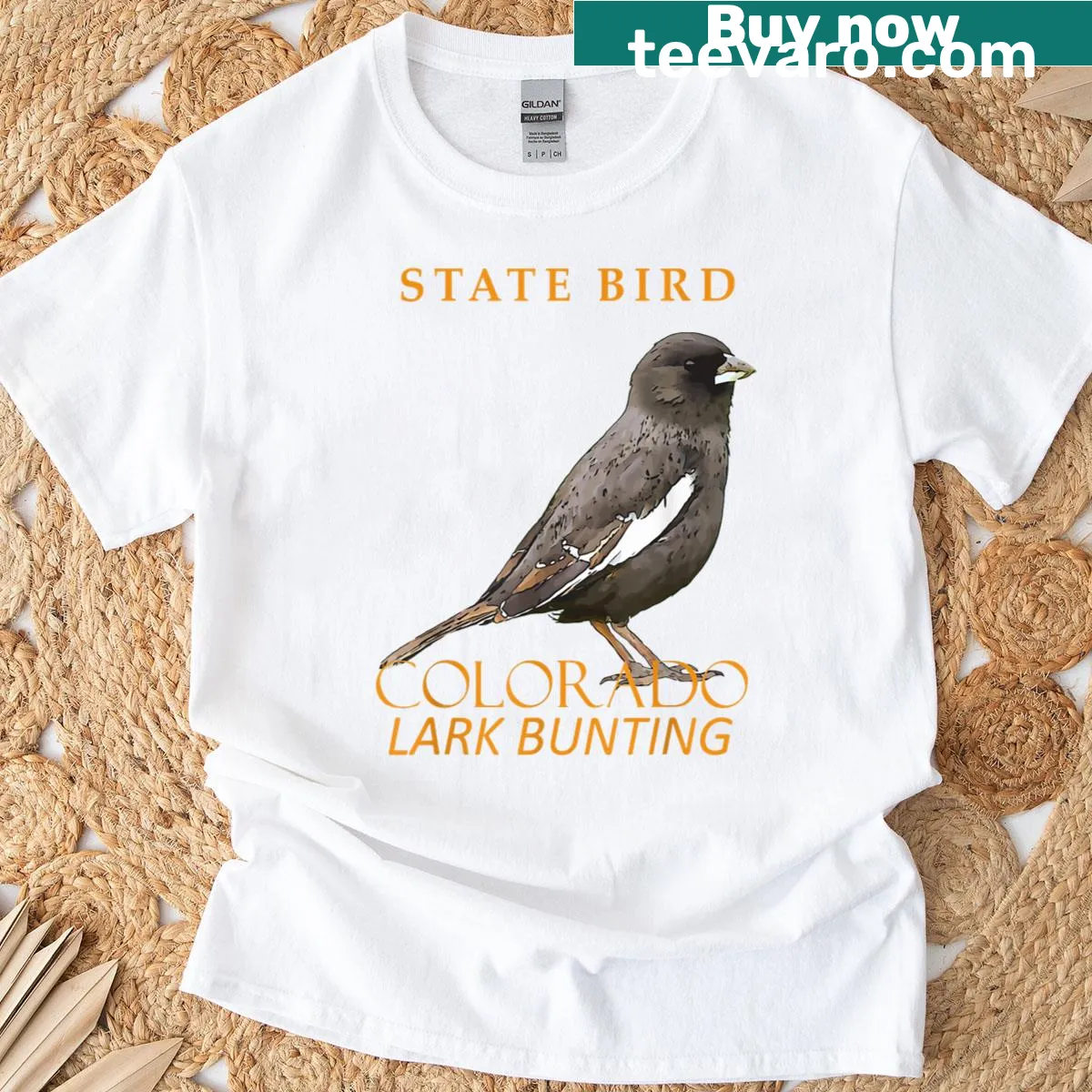 Illustration of Colorado's state bird, the Lark Bunting — on a men's t-shirt