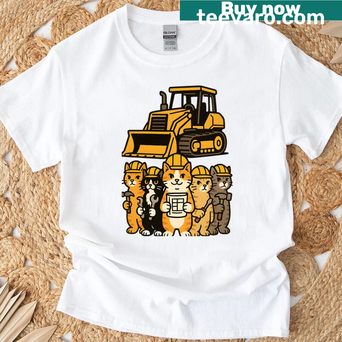 Oversized T-shirt with cartoon cats dressed as construction workers. — on a men's t-shirt