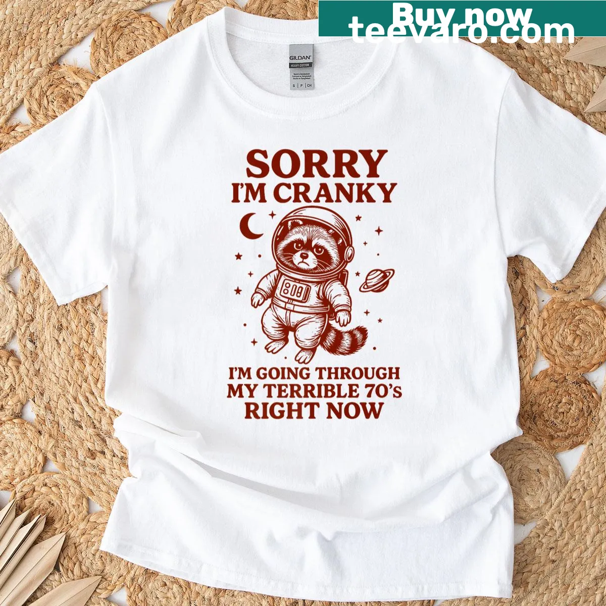 Illustration of a cranky raccoon for a funny 70th birthday t-shirt — on a men's t-shirt