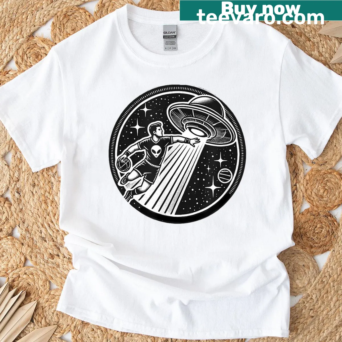 Illustrated T-shirt featuring a playful alien playing dodgeball — on a men's t-shirt
