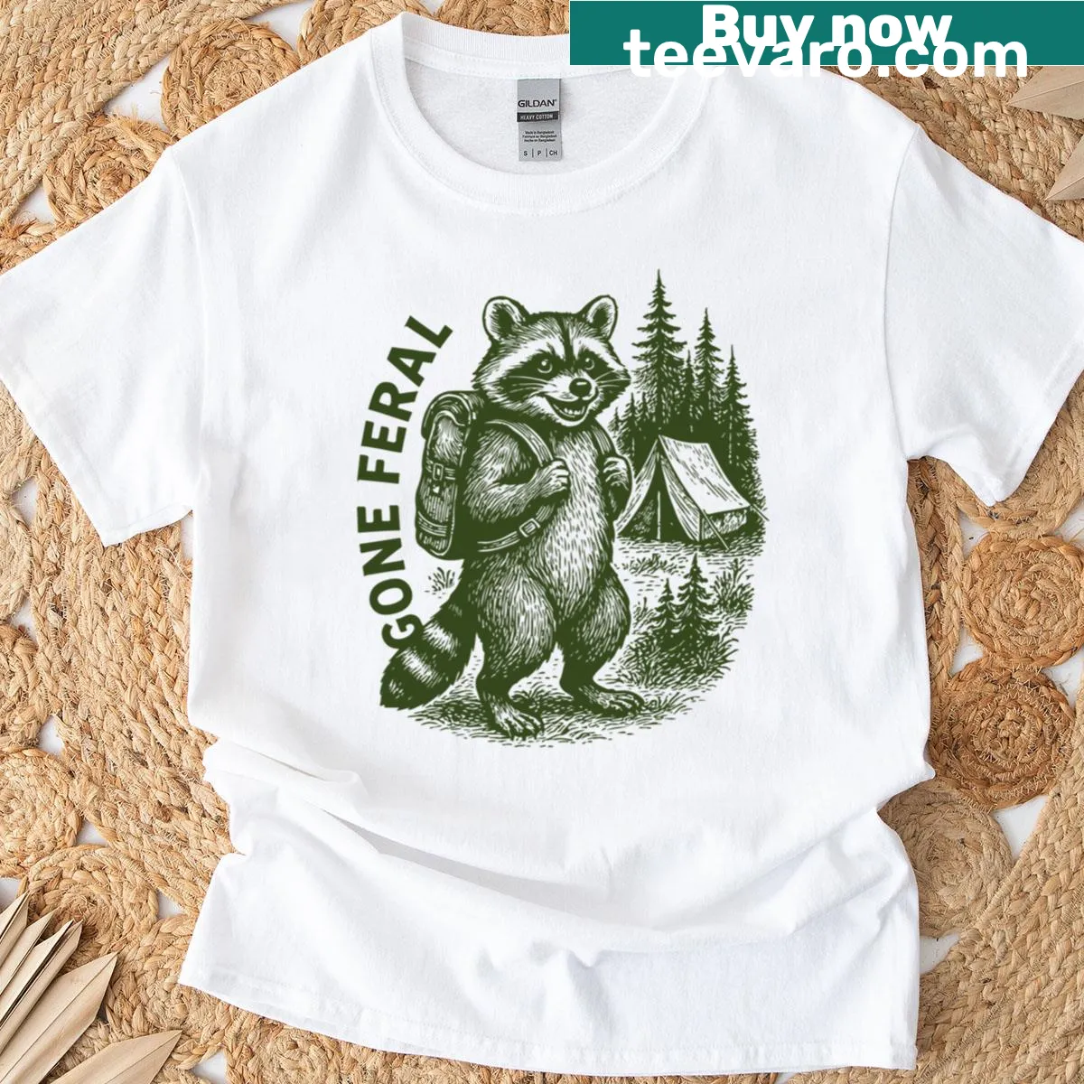Bold typography 'Gone Feral' on a survival-themed T-shirt. — on a men's t-shirt