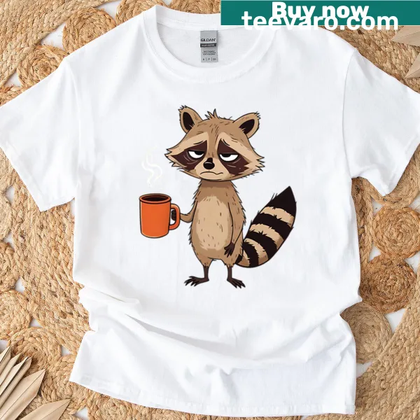 Cartoon grumpy raccoon with coffee mug on a t-shirt