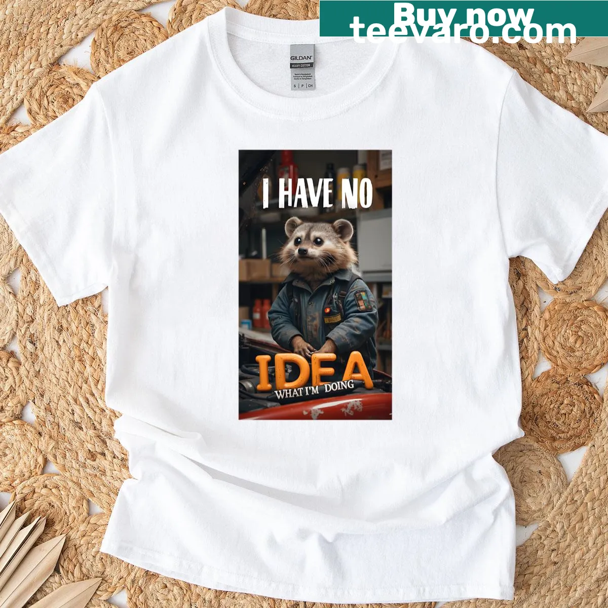 Cute T-shirt featuring a baby raccoon as a mechanic — on a men's t-shirt