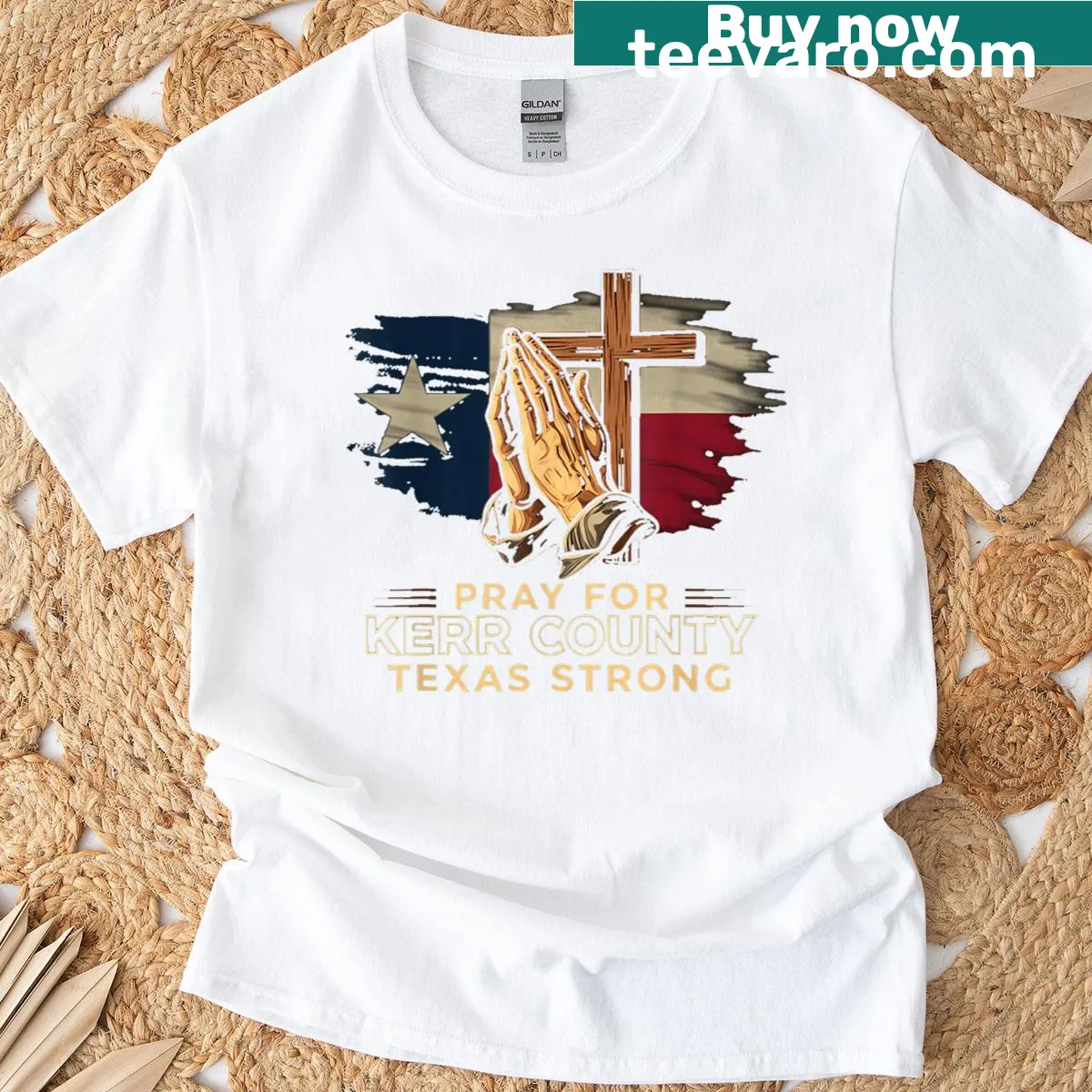 T-shirt with badge design representing Kerr County strength — on a men's t-shirt