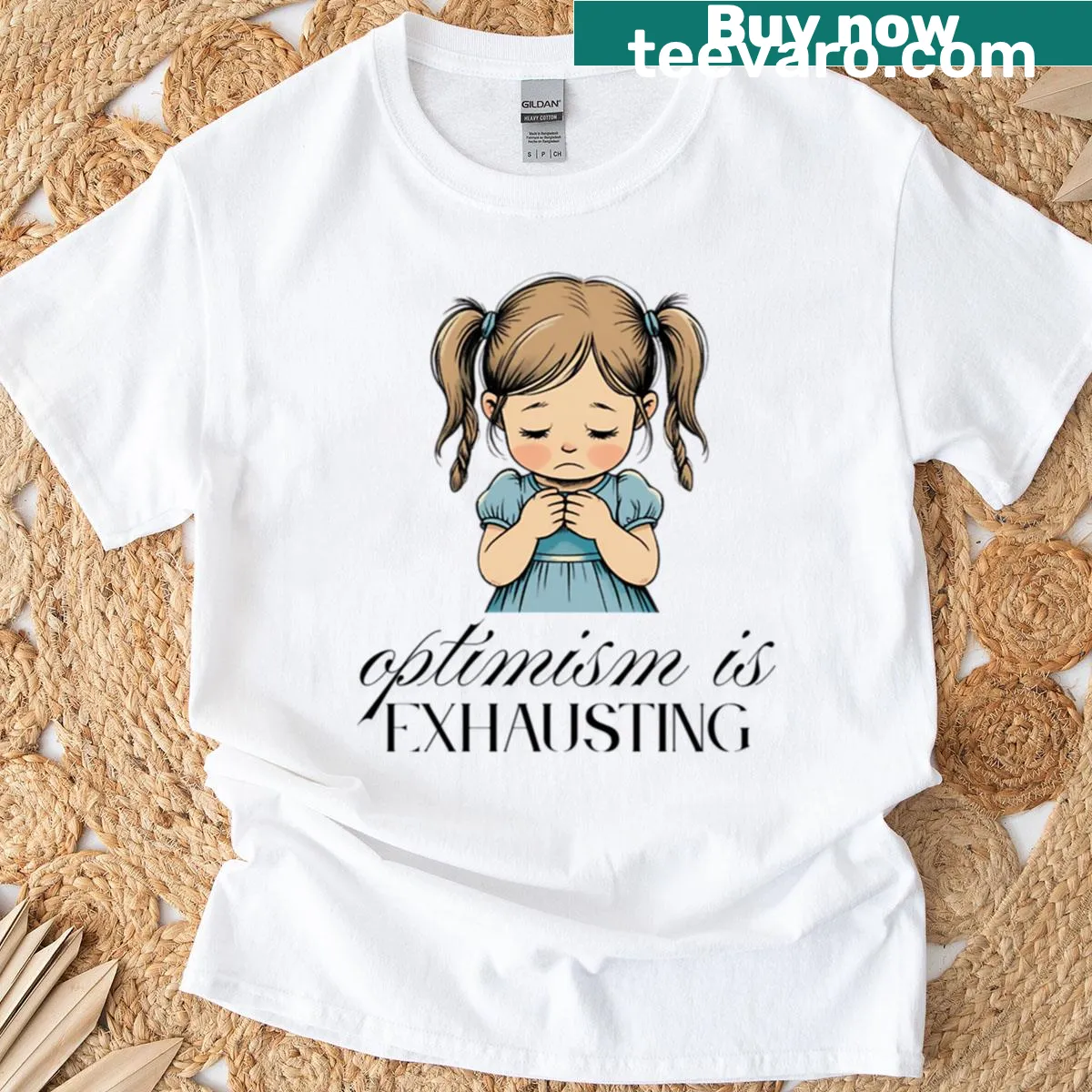 Graphic t-shirt with the phrase 'Optimism Is Exhausting' in a trendy design — on a men's t-shirt