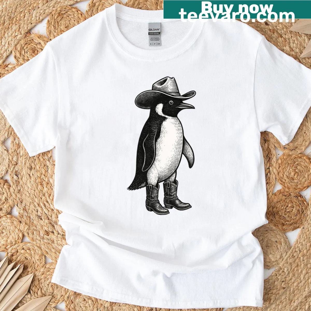 Graphic T-shirt featuring a cowboy penguin in a humorous rodeo scene. — on a men's t-shirt