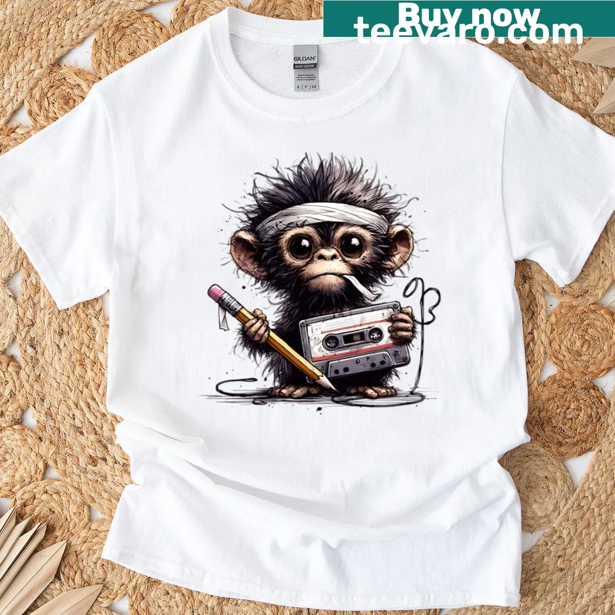 Retro monkey graphic holding a cassette tape on a boxy T-shirt — on a men's t-shirt