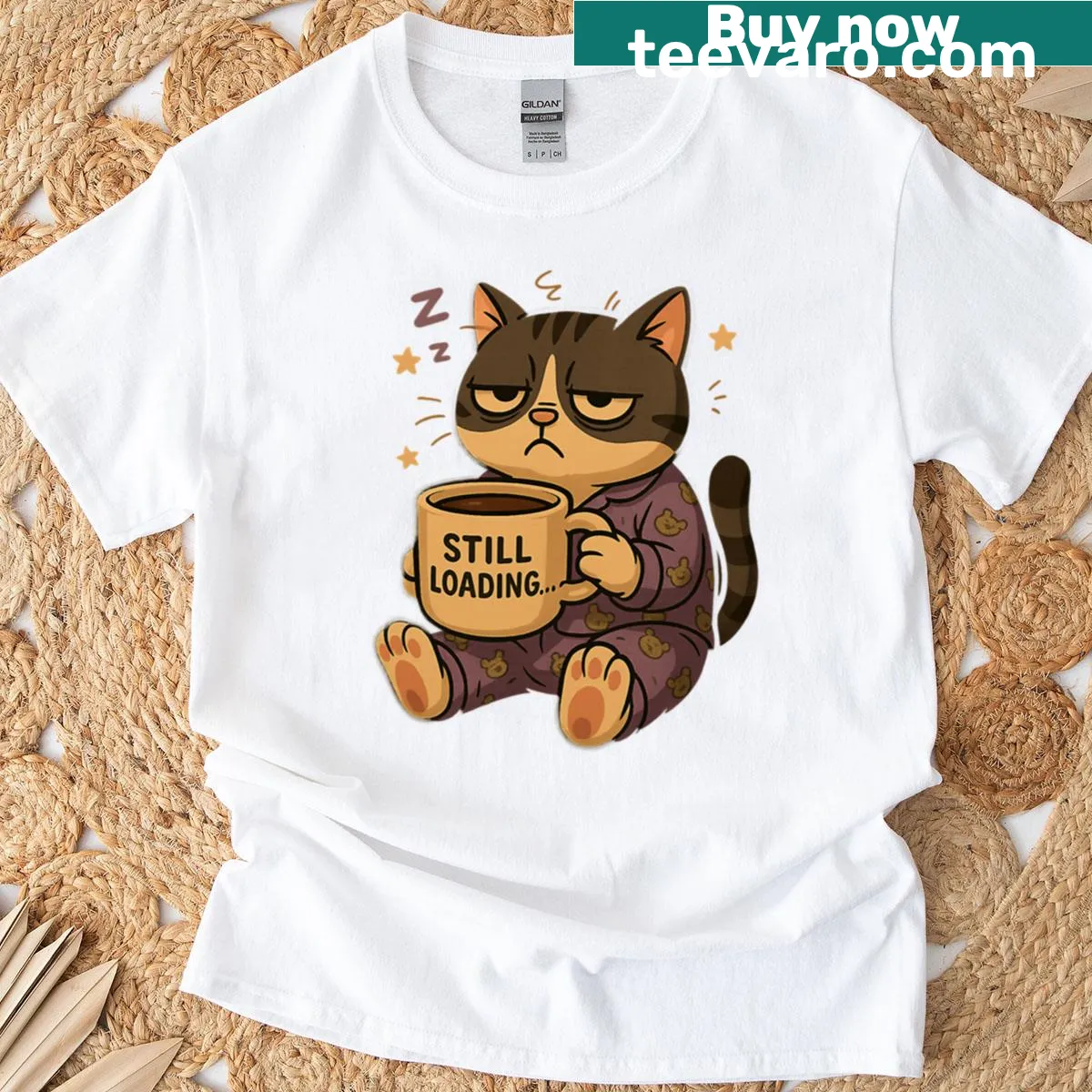 T-shirt featuring a lazy cat and the phrase 'Still Loading Coffee First' — on a men's t-shirt