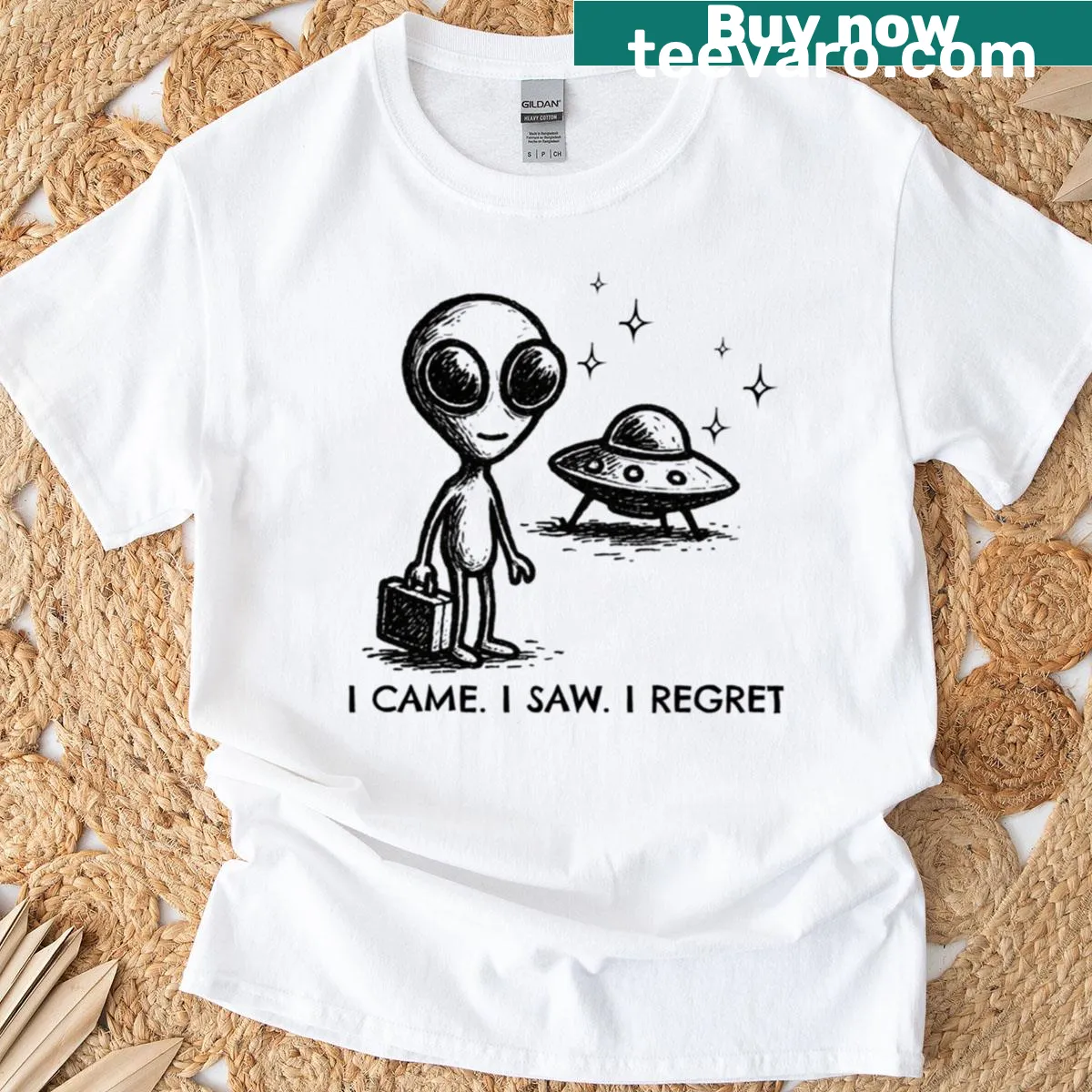 Minimalist tee with UFO and introvert saying design — on a men's t-shirt