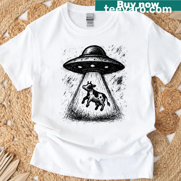 Quirky Ufo milk graphic on a black T-shirt