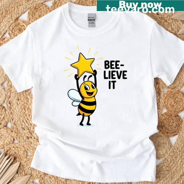 Playful typography t-shirt with the pun 'Bee-lieve It' and cute bee graphics.