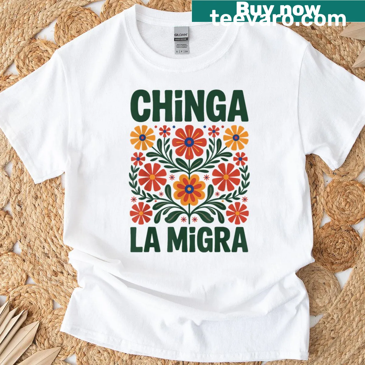 Pro-immigration T-shirt with Chinga La Migra phrase for human rights — on a men's t-shirt