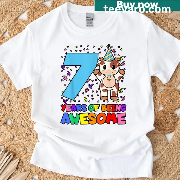 Cow illustration with party hat on birthday-themed T-shirt