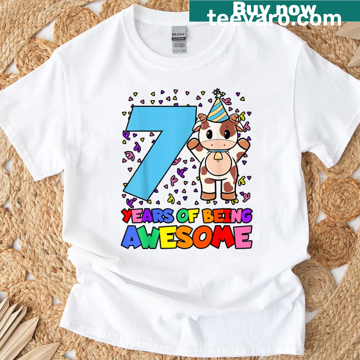 Cow illustration with party hat on birthday-themed T-shirt — on a men's t-shirt