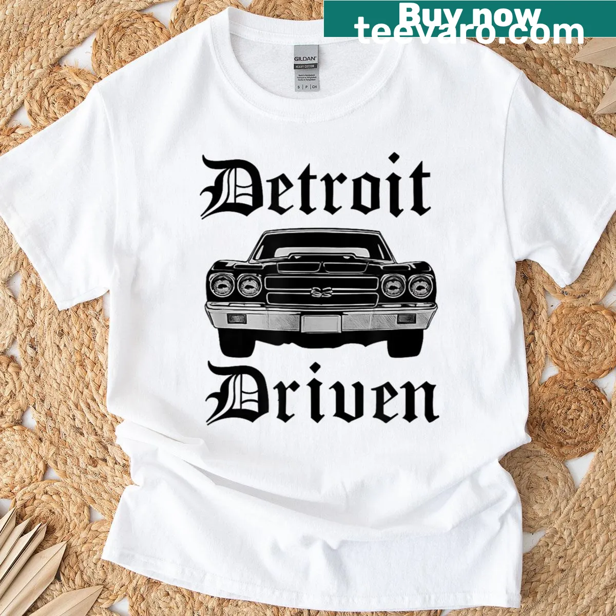 Text design promoting Detroit and muscle car culture on a T-shirt. — on a men's t-shirt