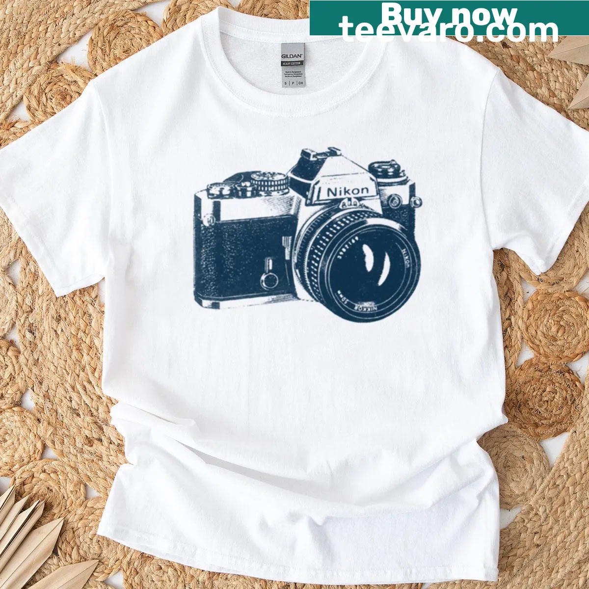 Vintage T-shirt featuring a 35mm Nikon film camera graphic — on a men's t-shirt