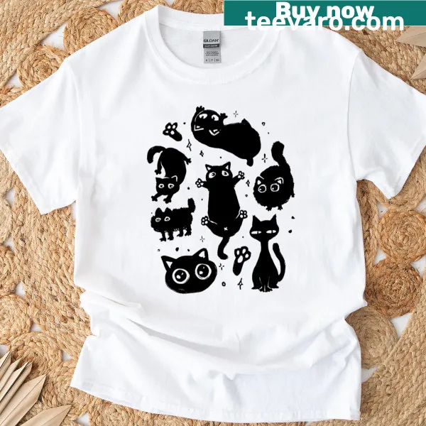 Whimsical T-shirt featuring cute illustrations of black cats.