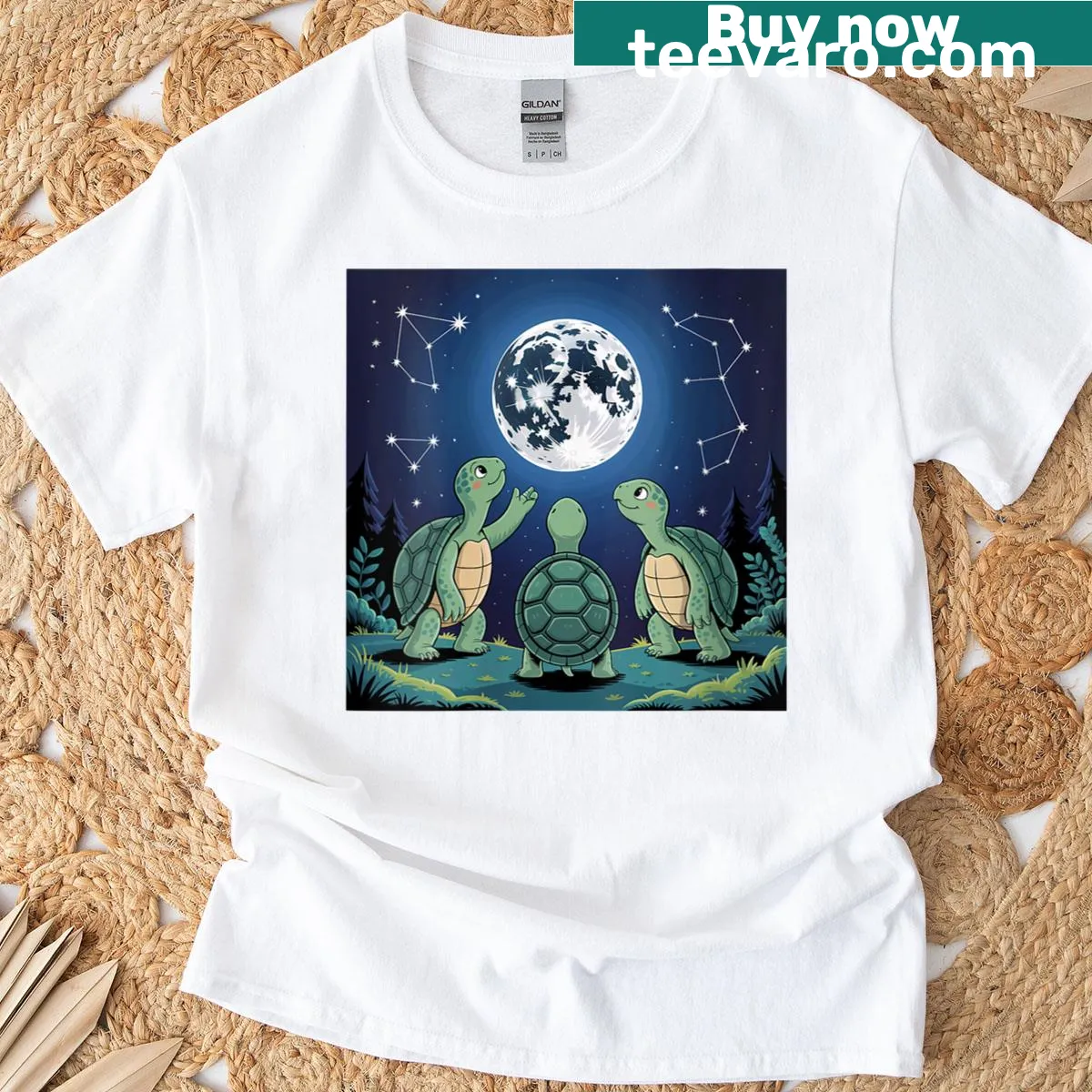 Whimsical turtles howling at the moon graphic on women's t-shirt — on a men's t-shirt