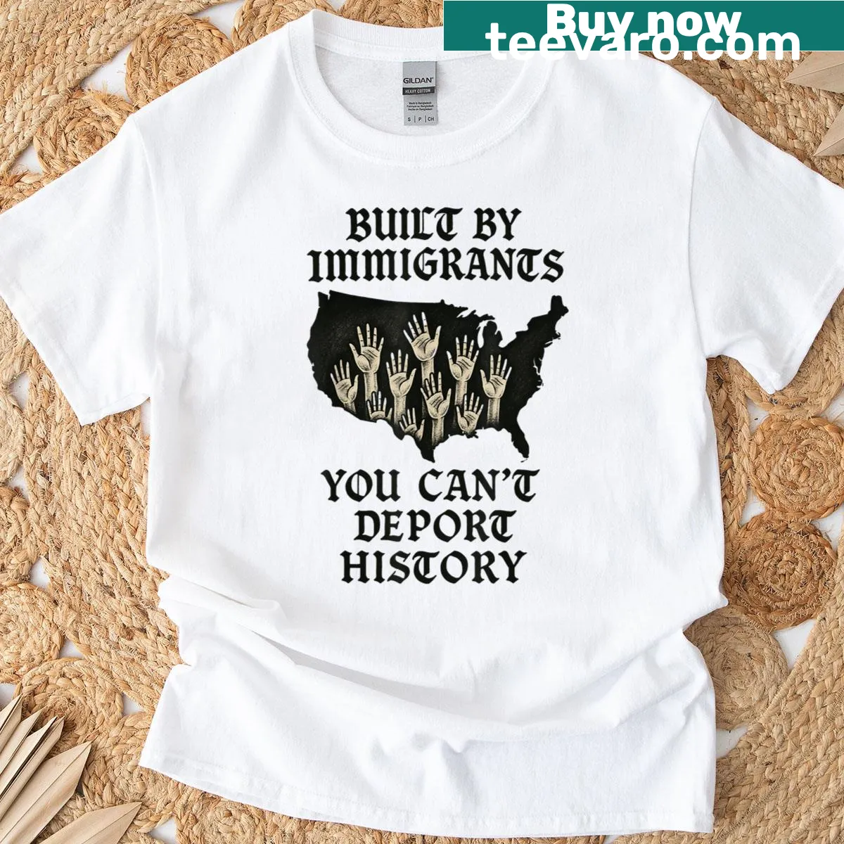 Pro-immigration shirt with 'Built By Immigrants' message. — on a men's t-shirt