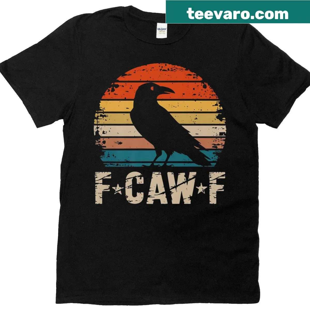 Vintage-style T-shirt with a black crow and sunset design — on a men's t-shirt