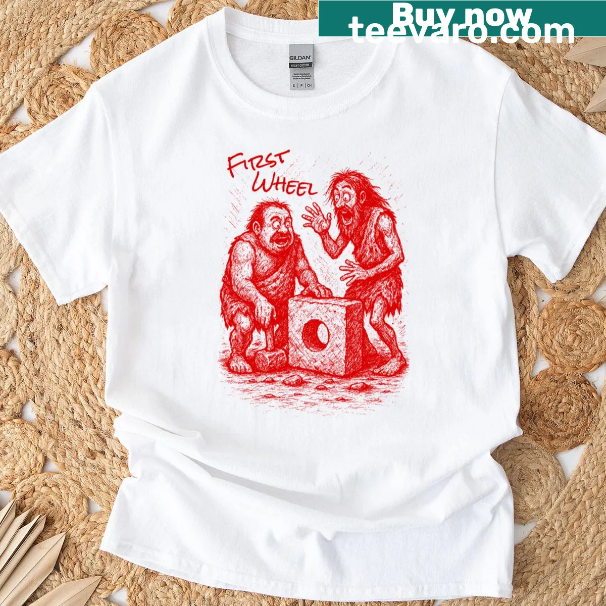 Cartoon bicycle design with text 'First Wheel' on a t-shirt — on a men's t-shirt