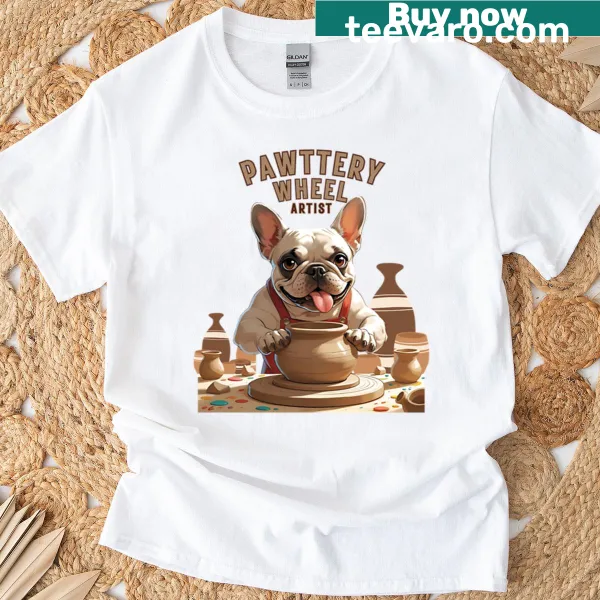 French Bulldog balancing on a pottery wheel with clay around it