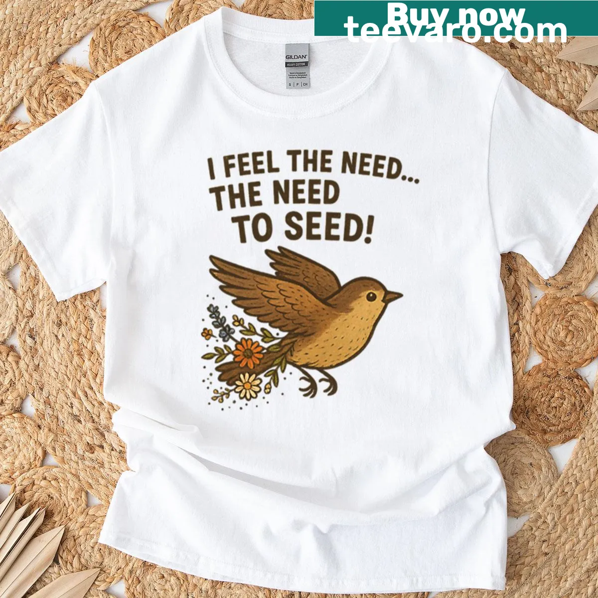 Funny oversized T-shirt with bird pun about seeding — on a men's t-shirt