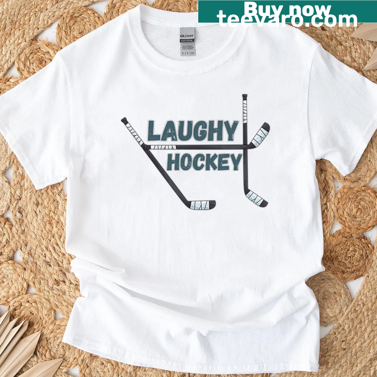 Oversized t-shirt featuring a humorous graphic of piled hockey sticks — on a men's t-shirt