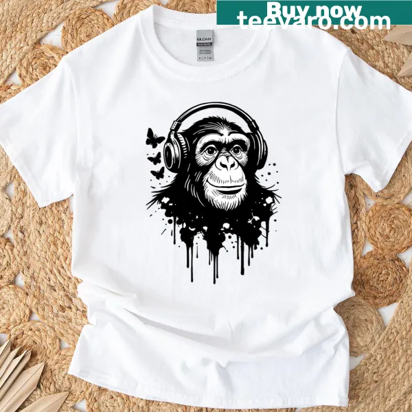 Cartoon monkey with headphones on a music-themed t-shirt