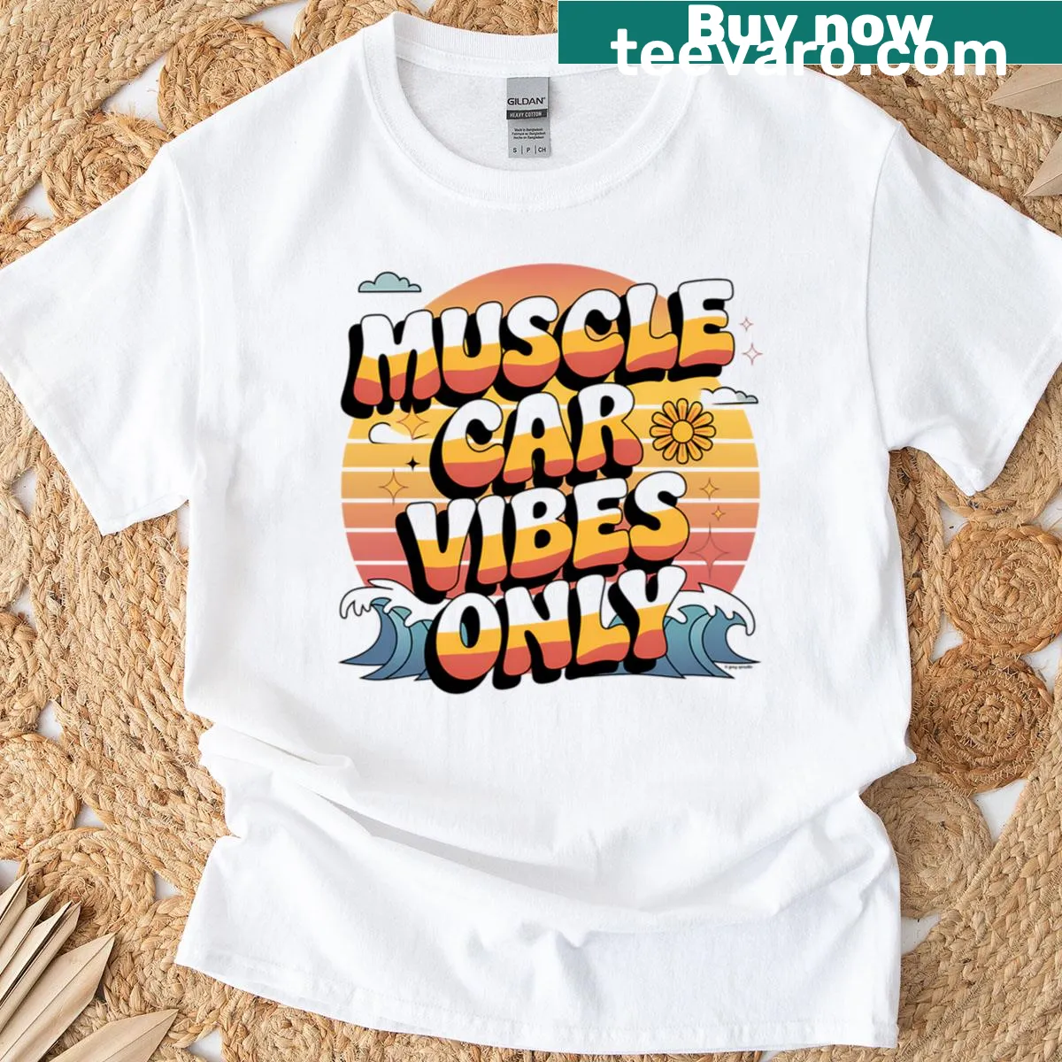 Retro graphic T-shirt showcasing muscle car vibes with a sunset design. — on a men's t-shirt