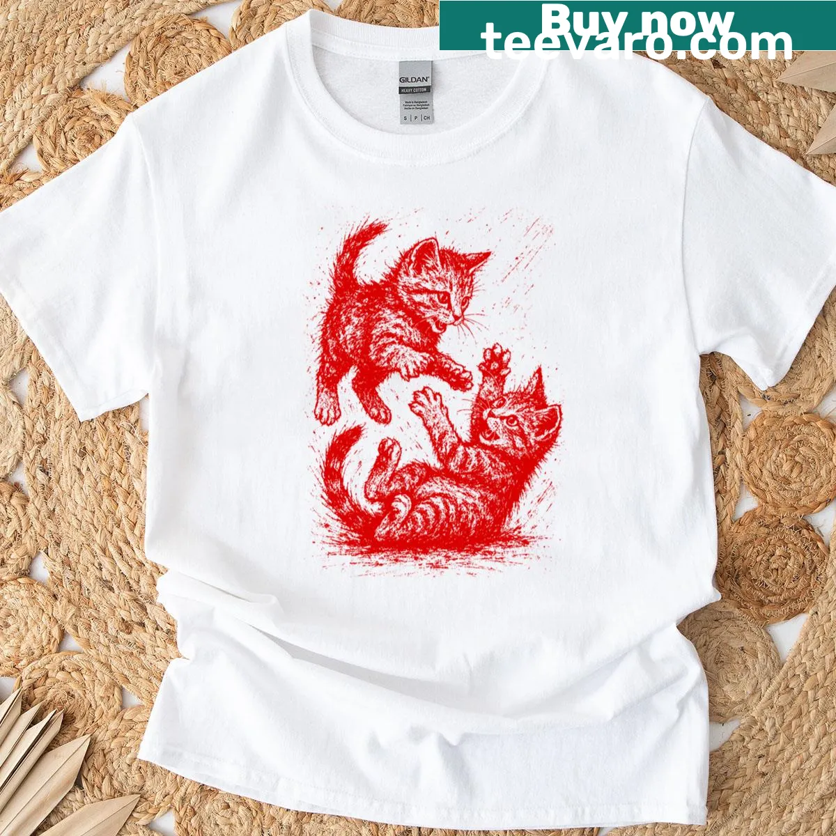 Adorable T-shirt featuring playful cats design — on a men's t-shirt
