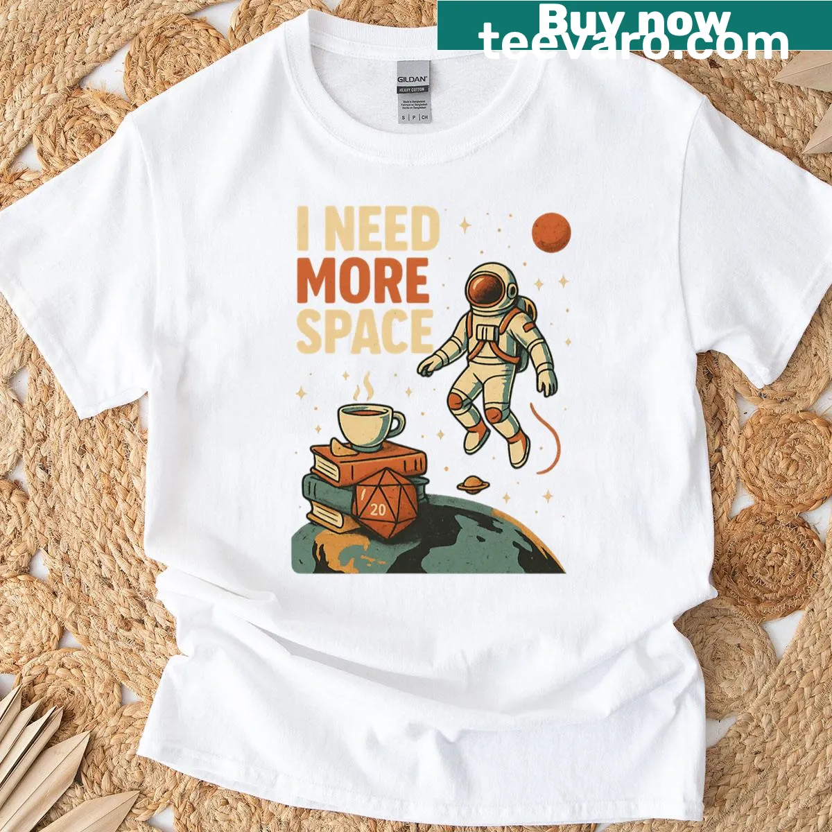 Astronaut graphic with 'I Need More Space' text on t-shirt — on a men's t-shirt