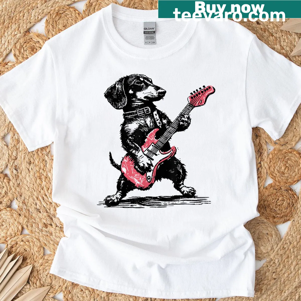 Vintage style dachshund playing guitar graphic T-shirt — on a men's t-shirt