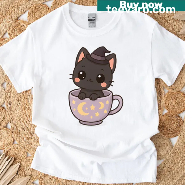 T-shirt featuring an illustration of a witch cat in a teacup.
