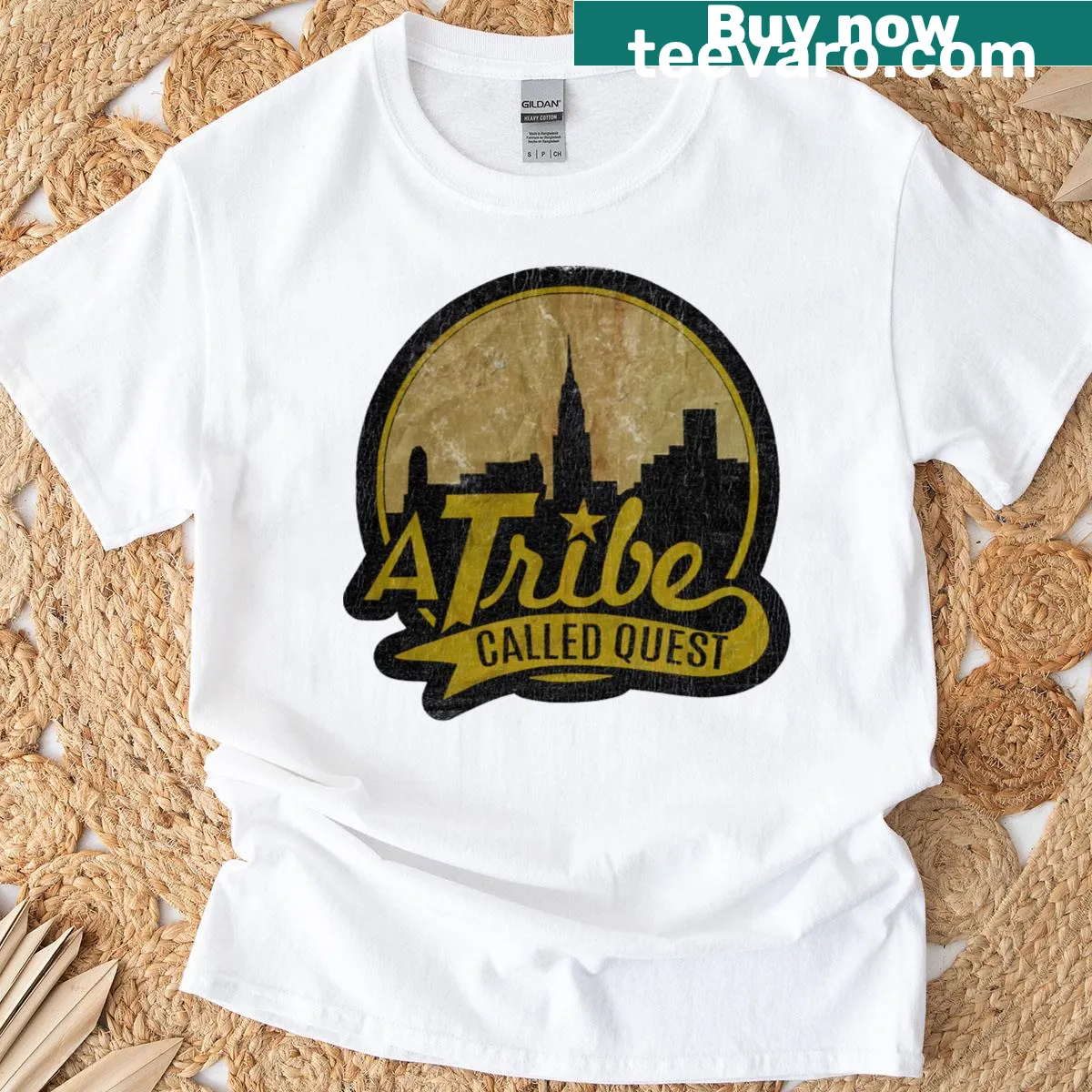 Vintage-style t-shirt featuring A Tribe Called Quest graphic — on a men's t-shirt