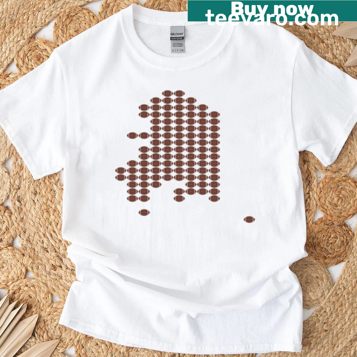 Alaska themed football graphic t-shirt with wilderness illustration — on a men's t-shirt